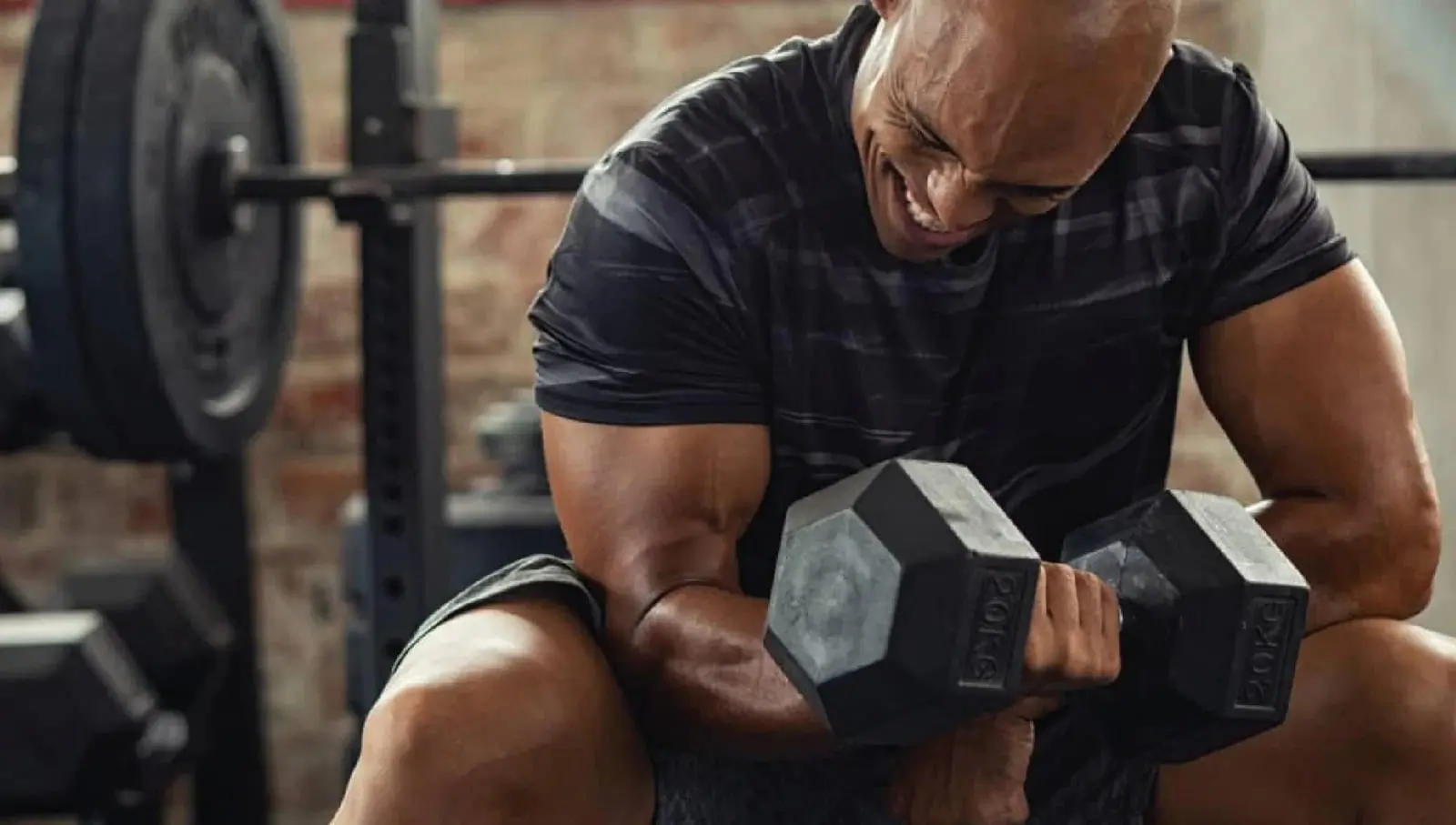 Men exercise with dumbbells on Fitsse